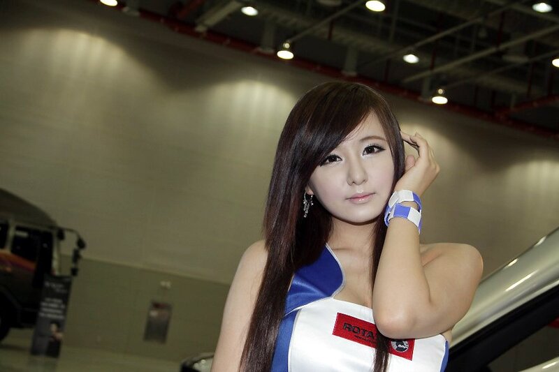 Woman in Blue and White Dress — Neutral, Photograph