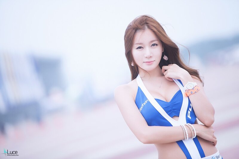 Woman in Blue and White Outfit — Calm, Photograph