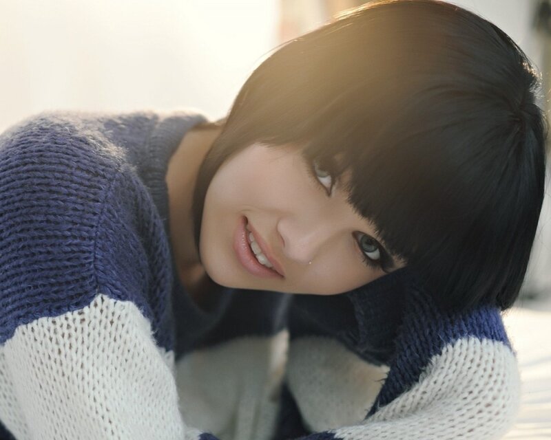 woman in blue and white sweater