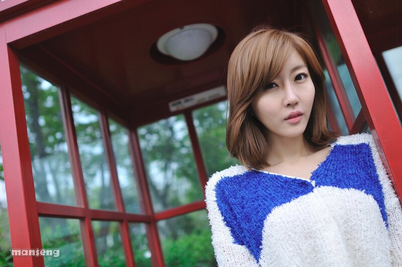 woman in blue and white sweater