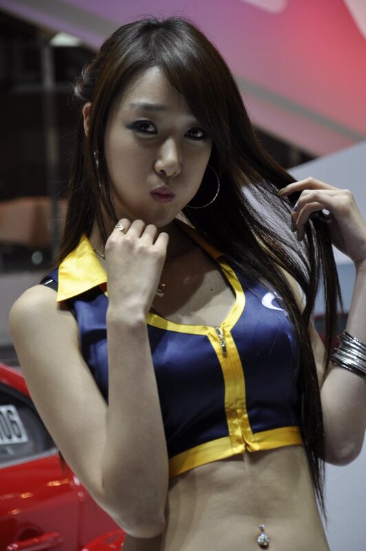 woman in blue and yellow top