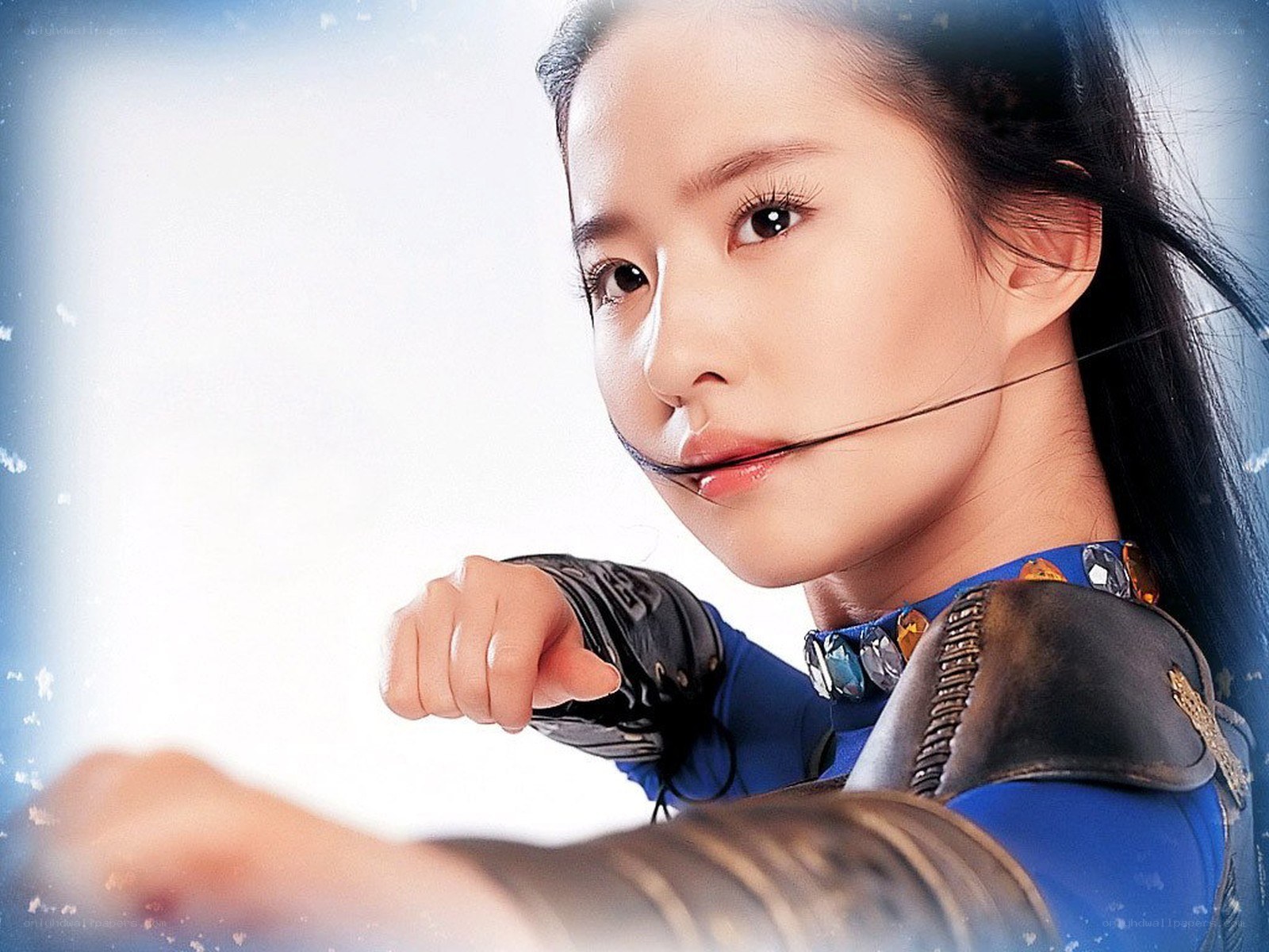 woman in blue armor