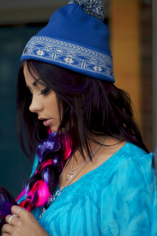 woman in blue beanie