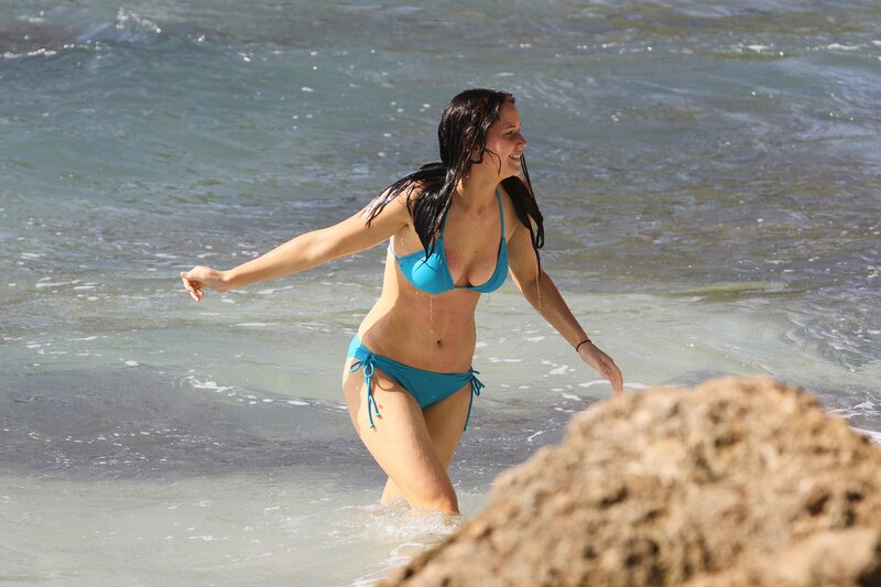 Woman in blue bikini at beach