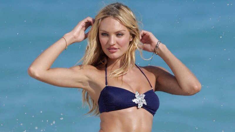 woman in blue bikini at beach