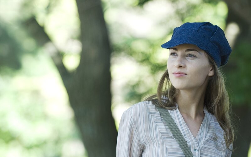 woman in blue cap outdoors