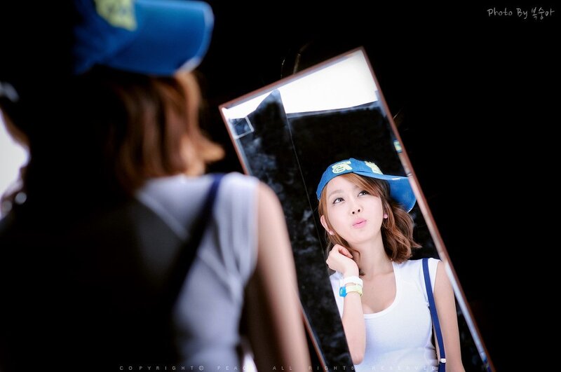 Woman in Blue Cap