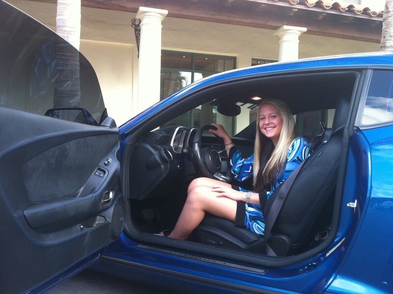 Woman in Blue Car — Happy