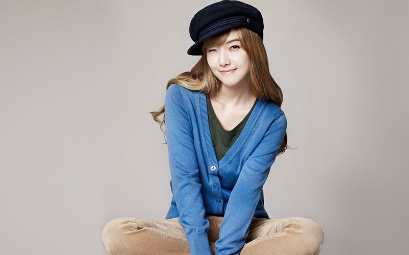 Woman in Blue Cardigan — Calm