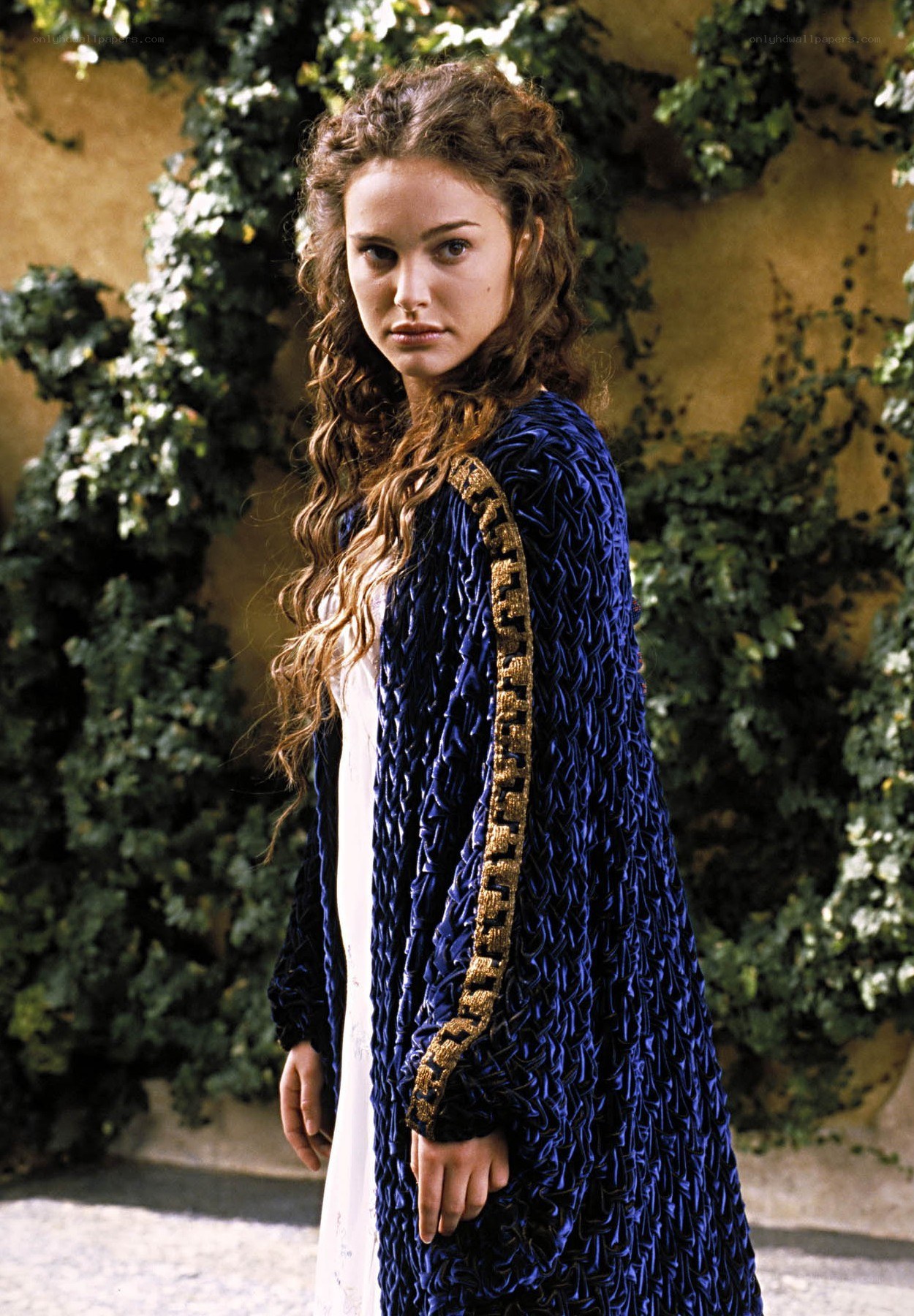 woman in blue cloak