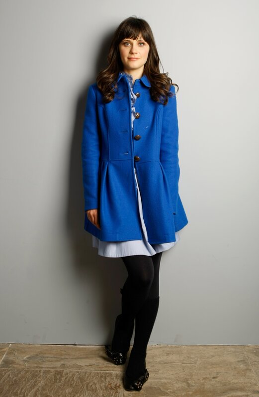 woman in blue coat