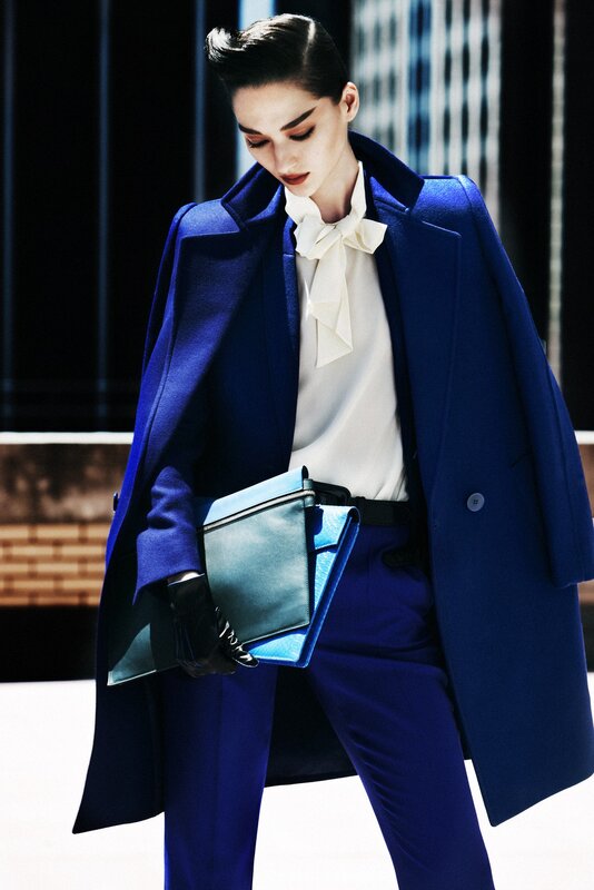 woman in blue coat