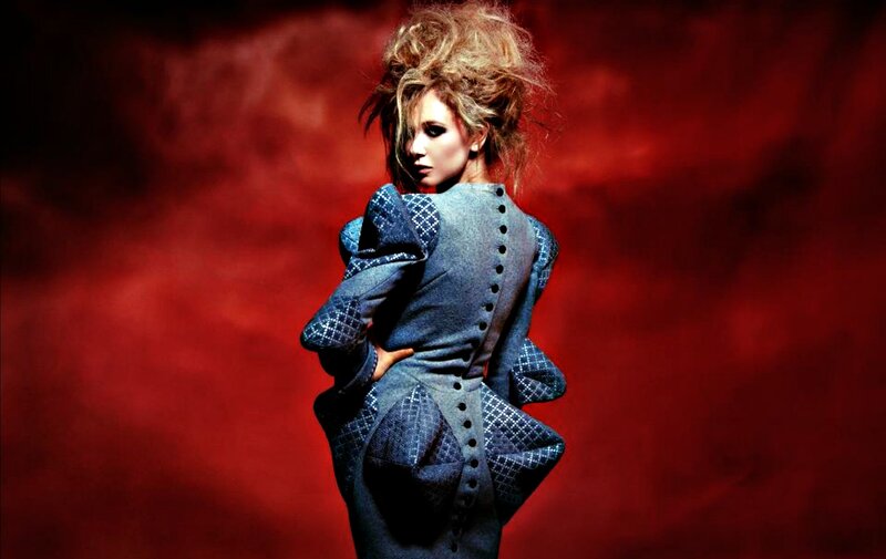 Woman in Blue Coat — Red, Dramatic