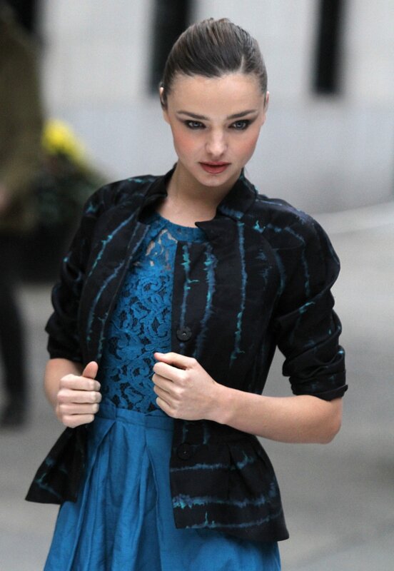 woman in blue dress and jacket