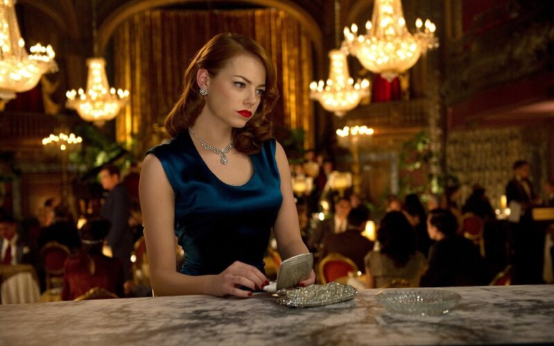 Woman in blue dress at bar