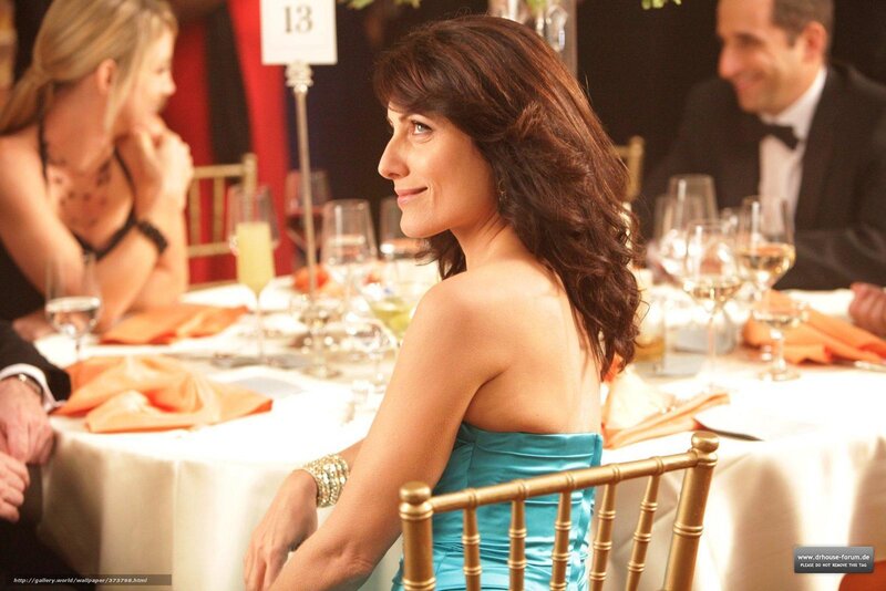 woman in blue dress at dinner