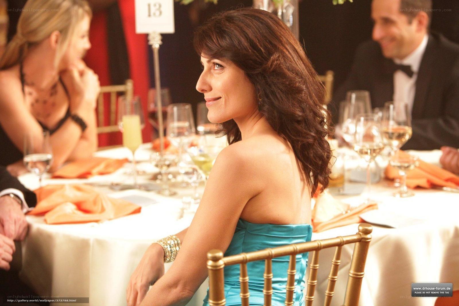 woman in blue dress at dinner