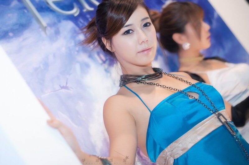 woman in blue dress at event