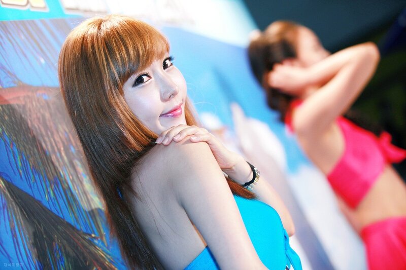 woman in blue dress at event