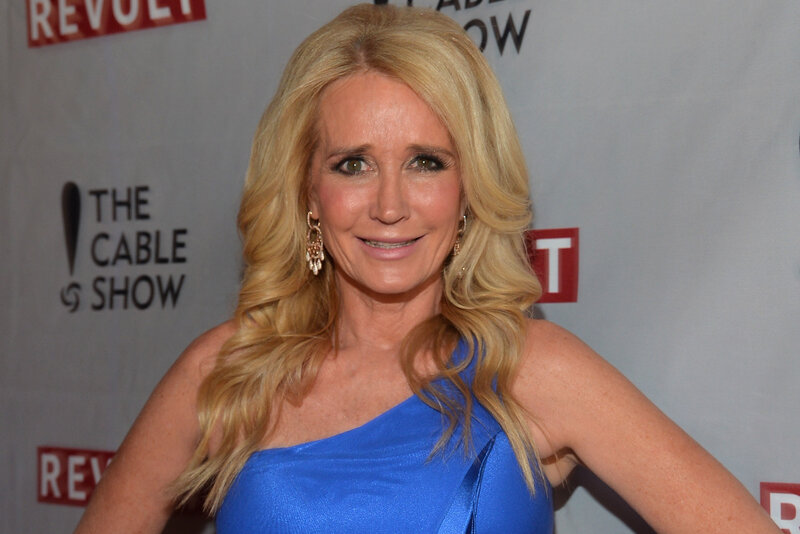 woman in blue dress at event