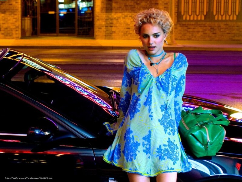 woman in blue dress at night