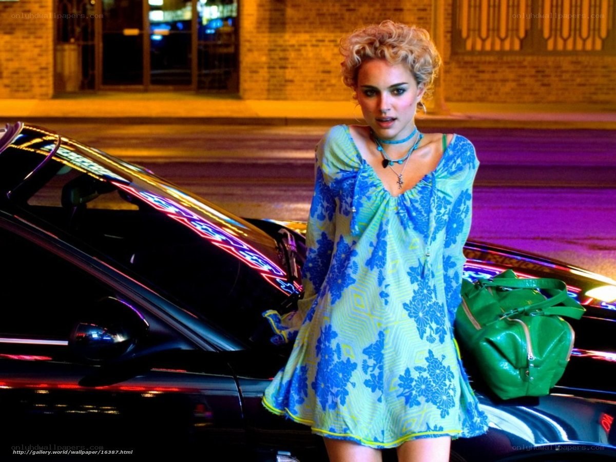 woman in blue dress at night