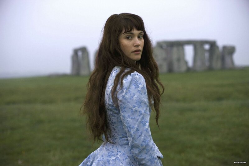 woman in blue dress at stonehenge