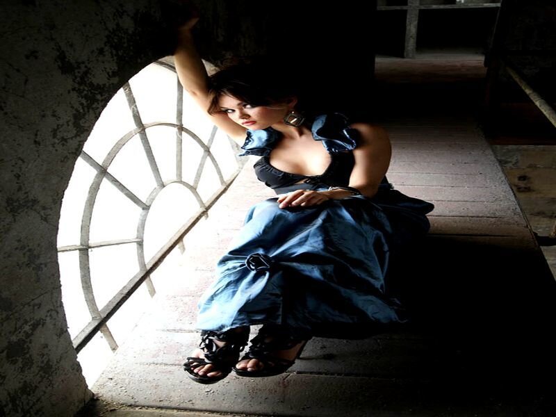 Woman in Blue Dress — Dramatic, Daytime, Photograph