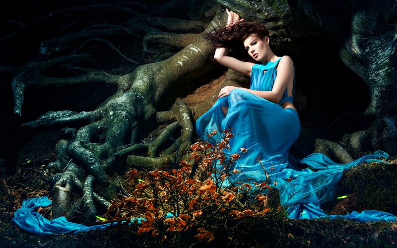 Woman in Blue Dress — Dramatic, Night, Photograph, Tree Roots, Fallen Leaves