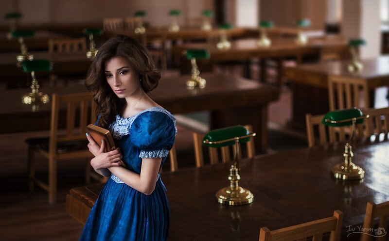 Woman in Blue Dress — Dramatic, Photograph, Book, Desk