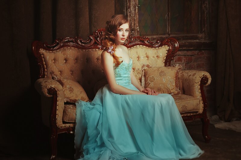 Woman in Blue Dress — Dramatic, Photograph, Couch, Pillow, Window