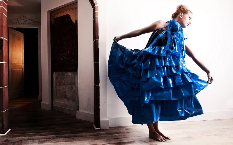 Woman in Blue Dress — Dramatic, Photograph, Doorway