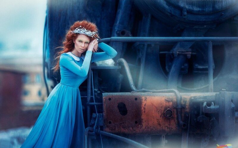 Woman in Blue Dress — Dramatic, Photograph, Train