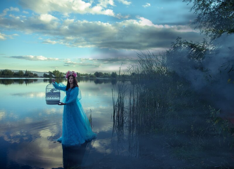 Woman in Blue Dress — Dramatic, Sunset, Photograph, Birdcage