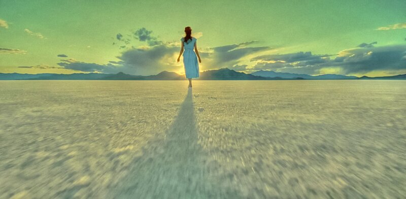 Woman in Blue Dress — Green, Serene, Sunset