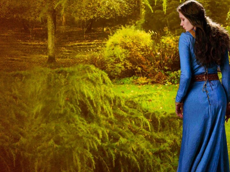 woman in blue dress in garden