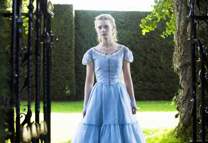 woman in blue dress in garden