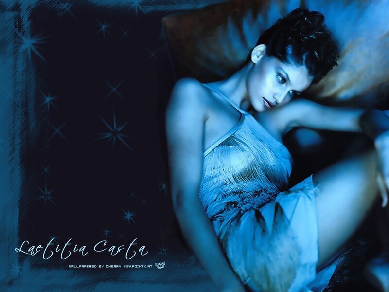 woman in blue dress lying down