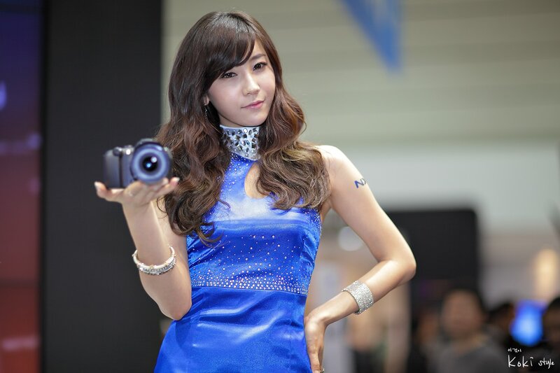 Woman in Blue Dress — Neutral, Photograph, Camera