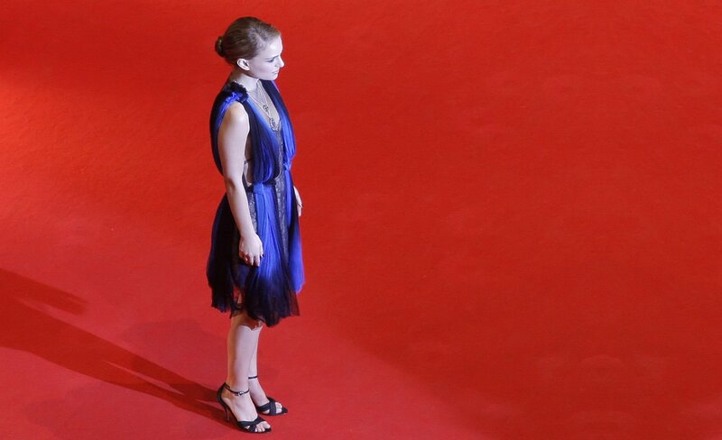 woman in blue dress on red carpet
