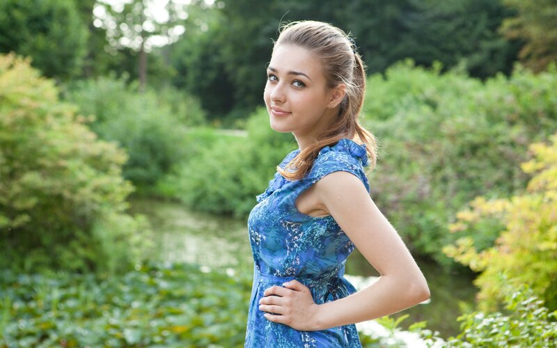 woman in blue dress outdoors