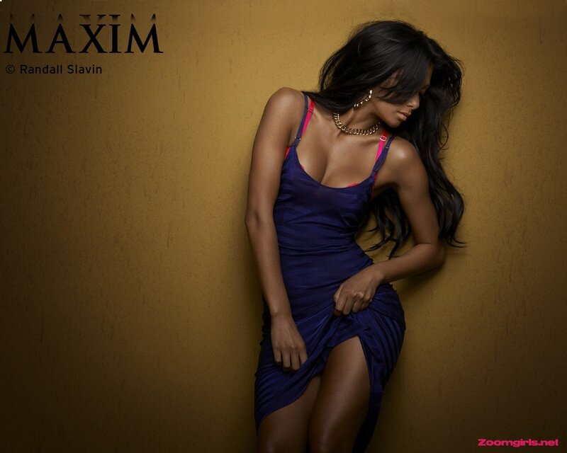 woman in blue dress posing
