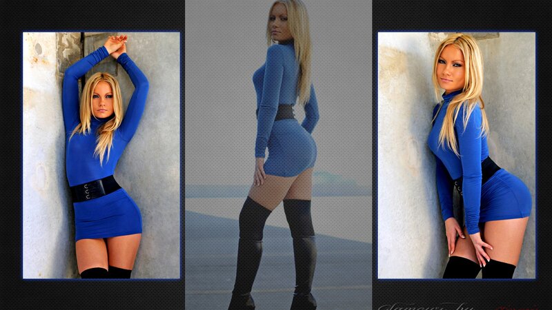woman in blue dress posing