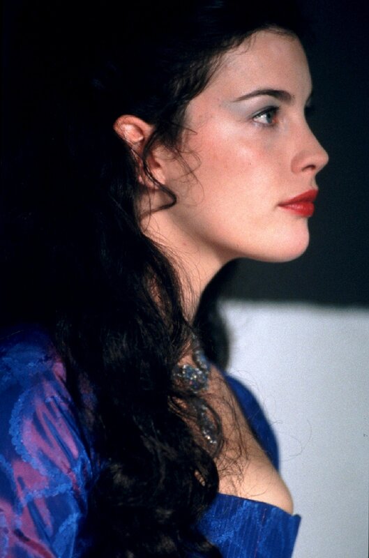 woman in blue dress profile