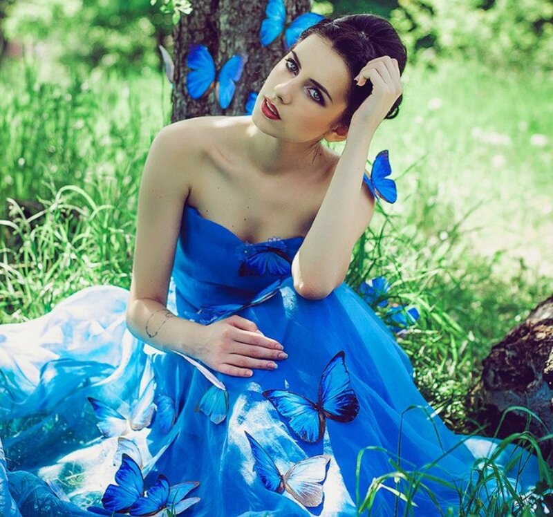 Woman in Blue Dress — Serene, Afternoon, Photograph, Butterflies, Tree