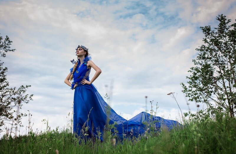 Woman in Blue Dress — Serene, Afternoon, Photograph, Crown, Butterfly