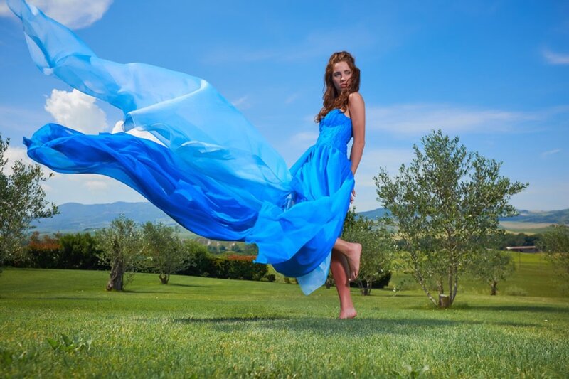 Woman in Blue Dress — Serene, Afternoon, Photograph, Grass, Trees, Mountains
