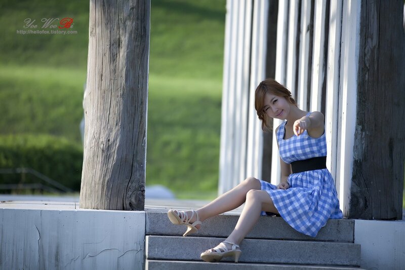 Woman in Blue Dress — Serene, Afternoon, Photograph, Steps