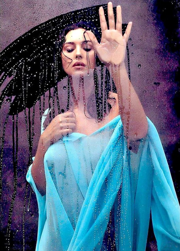 woman in blue dress under rain