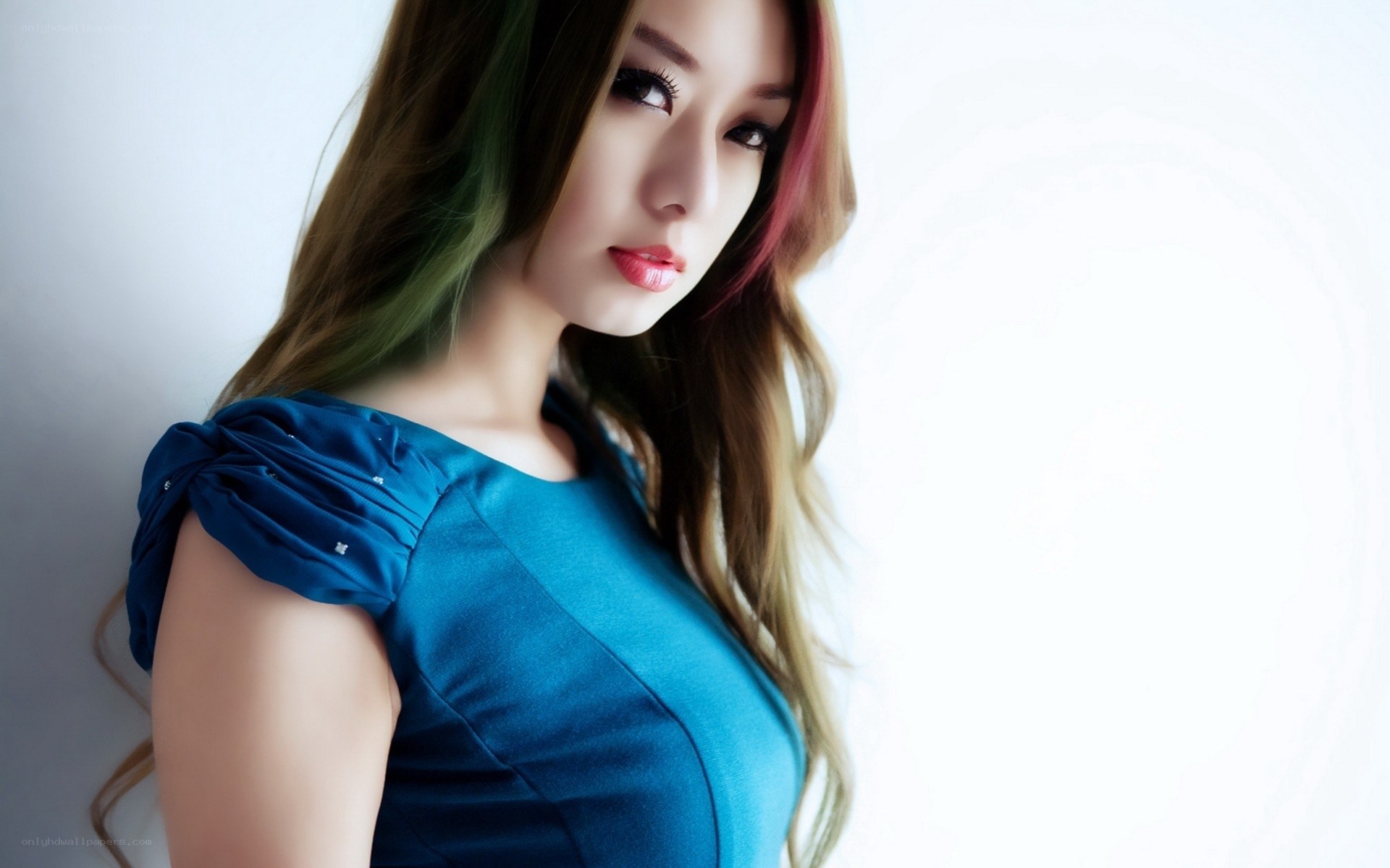 woman in blue dress with colorful hair